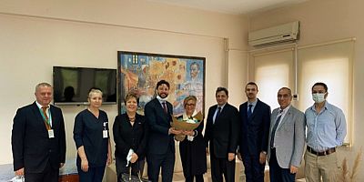 Baştürk’ten Okandan’a Plaket