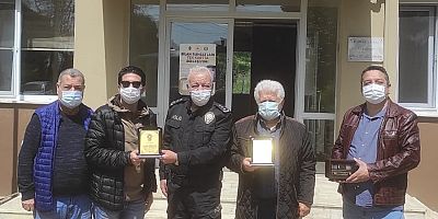 Güçlü’den Teşekkür Plaketi