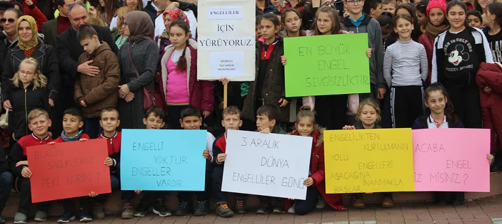 ENGELLiLER iÇiN YüRüDüLER